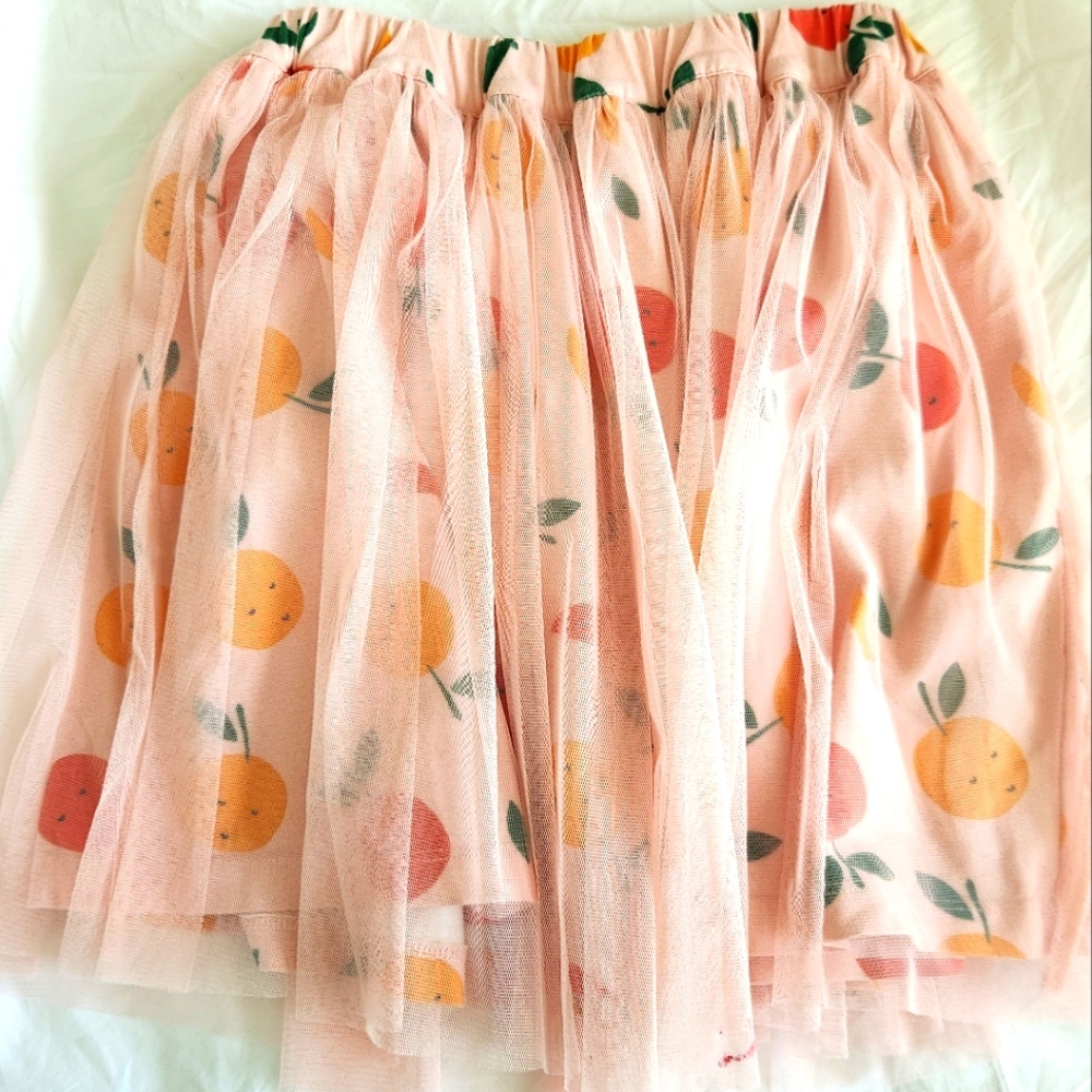Hannah Andersson skirt, pink tulle over apple motif. Girls size 6-7